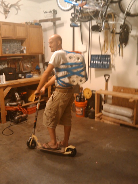 Back home. We had to figure out a way for red to get his paper towels home. Masking tape works.