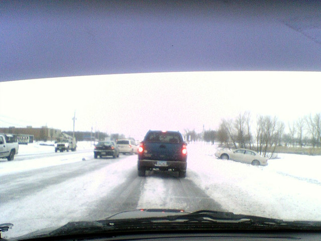 That white minivan just spun in a circle... I missed the photo