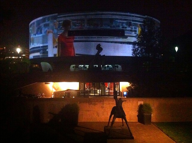 Giant video projection on the side of the Hirshhorn Museum