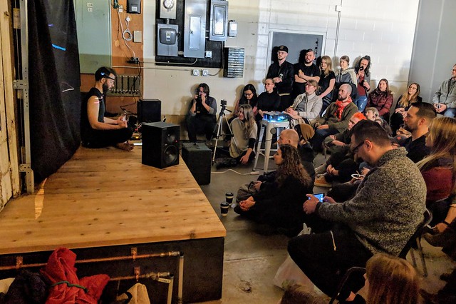 This dude was making music with his brain... using a mobile app that he wrote to map his brain frequencies (measured with a Muse EEG) to a sampler