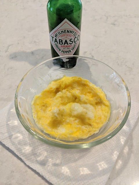 Take the egg out of the microwave and add Tabasco, or salt and pepper, or Cholula, or whatever so...