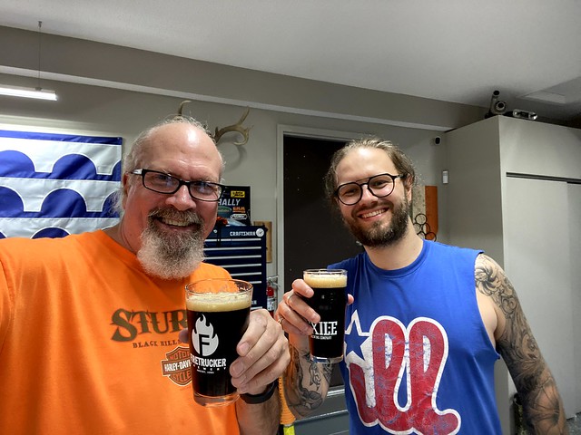 Home brewers drinking home brew
