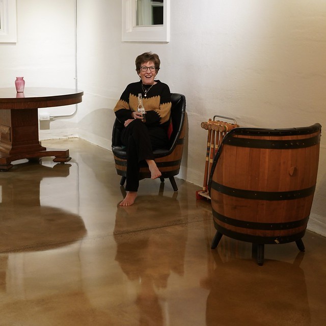 Chris tries out the barrel chairs