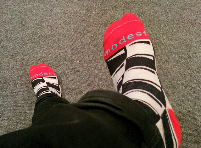 Watching footballs. Wearing these socks.