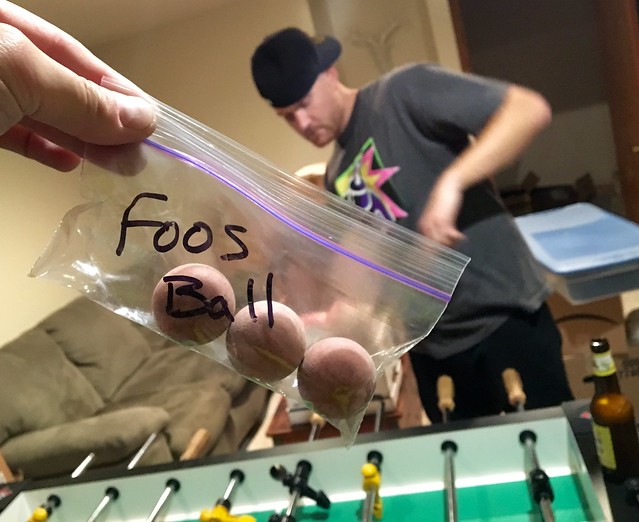 And here we are... The inaugural game in which we open up the foosballs and I beat red's ass