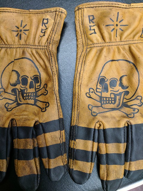 This is one of the coolest gifts I've ever given. Leather work gloves tattooed by Paul Nycz