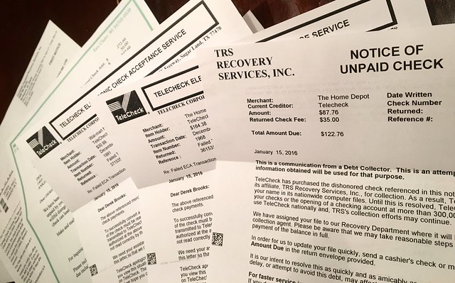 New hobby: chatting with collections agencies about how I didn't write personal checks at big box stores in Nebraska