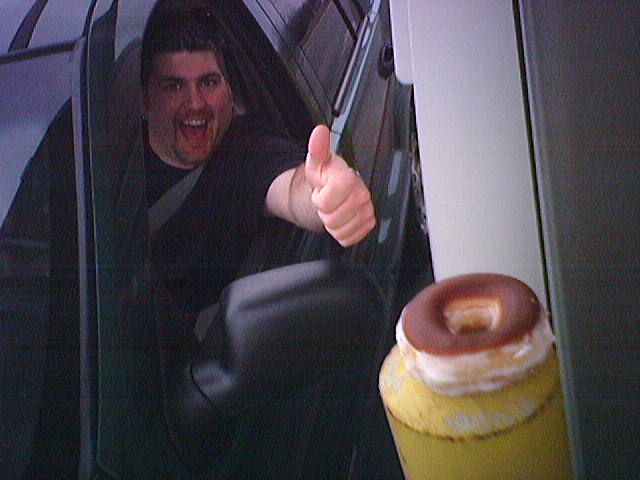 Kevi and a donut on a pole