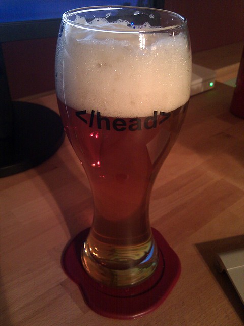 Working on a front-end bug while having a beer in a fitting glass.