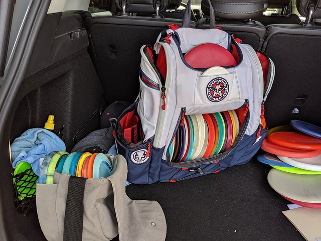 Kari's prinicpal, Eddie plays disc golf