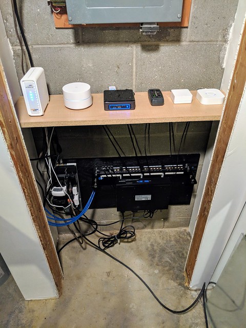 Mini network closet phase 2: added a shelf for the modem, router, nuc, and smarthome bridges