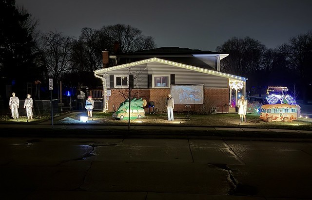 The folks across the street from Steph and Manuel’s project house have wild decorations… and a movie playing.