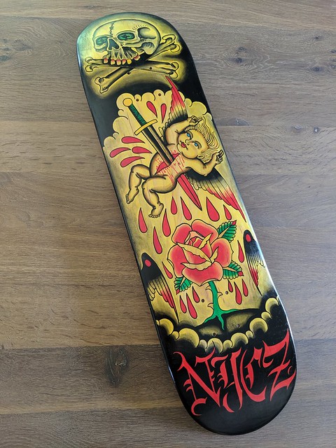 Kari got me this hand painted skateboard from local tattoo artist, Paul Nycz