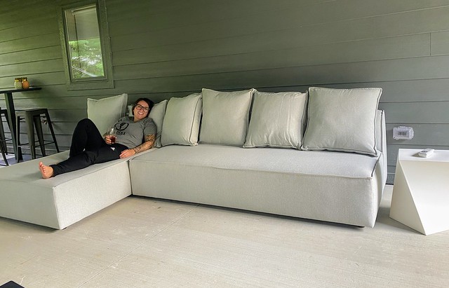 This girl’s excited about her new patio couch.