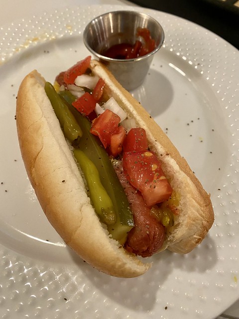 Washing down the mobiyashi dog with a Chicago dog