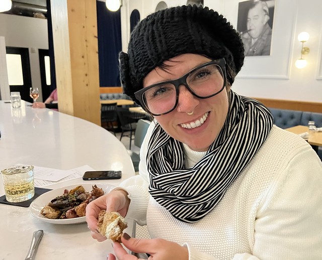 Kari is about to try a chicken wing!