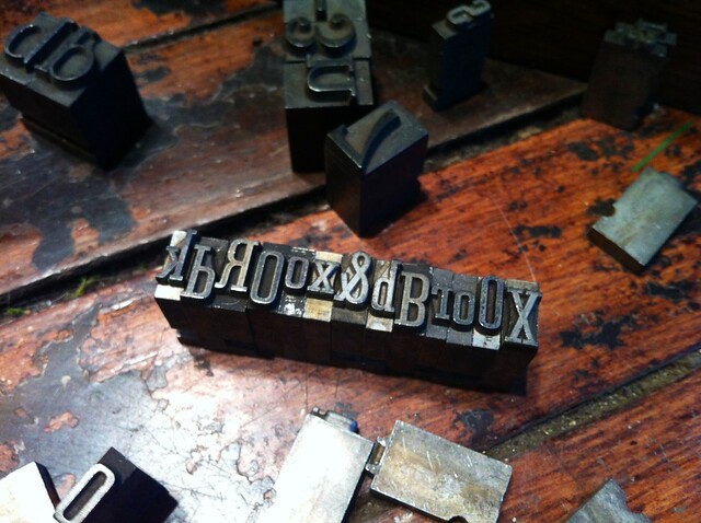 Playing with lead type at a gift shop