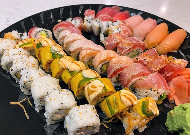 Kari wanted to order sushi. She picked four rolls and two pieces of smoked salmon nigiri... so I ...