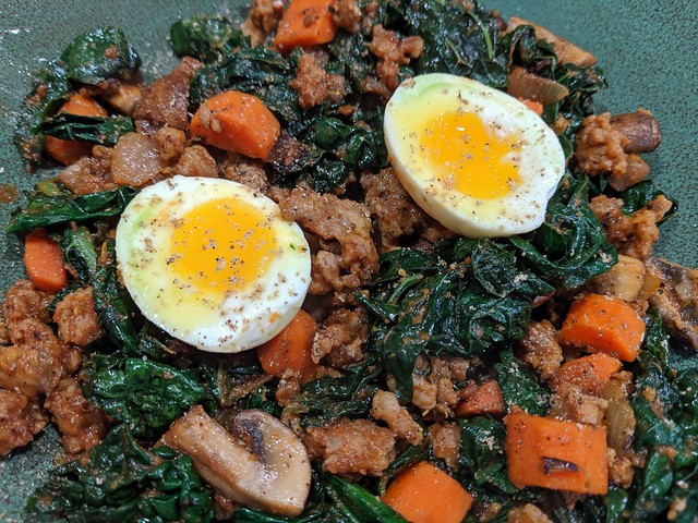 This sausage, carrot, kale, egg pile is gonna be tasty