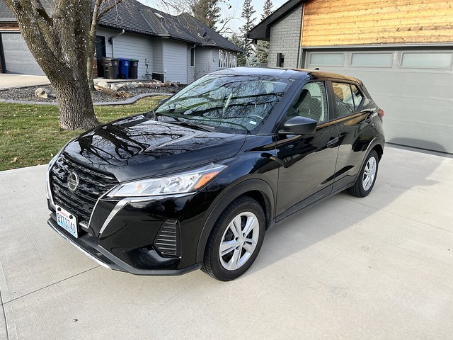 State Farm / Enterprise hooked it up with this lil baby sub-compact 4-door Nissan queef.