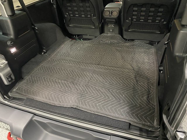 Replaced the back seat of my Jeep with a harbor freight moving blanket