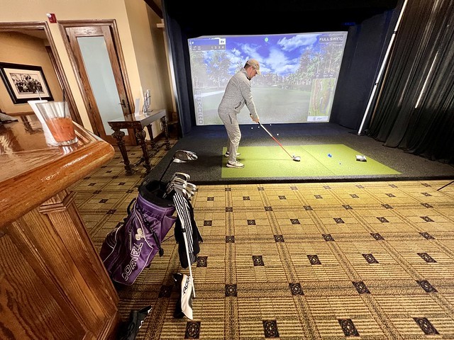 Playing Sawgrass on the simulator in the men’s locker room
