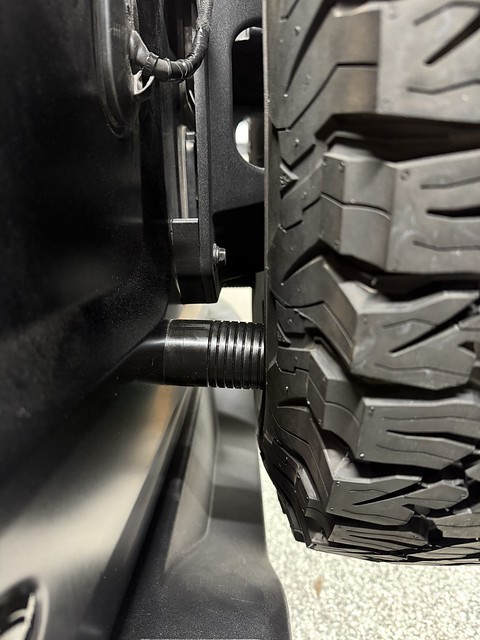 These Barnes 4x4 bumpstops are way better than the ones I made out of old JK bumpstops. I wish I had a tire carrier that sucked the wheel in closer to the body though.