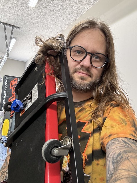 Forgot to put my hair up before sliding under the camper…