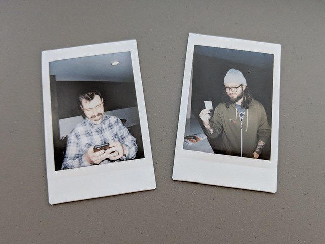A polaroid of me looking at the polaroid of Jeff