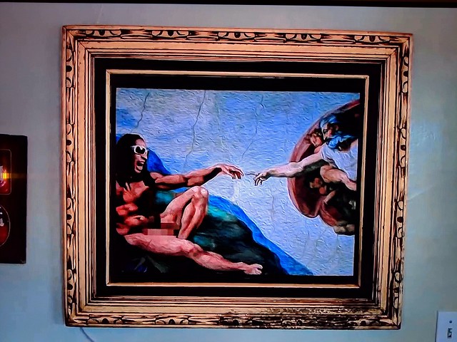 This is a painting of lil Jon in the creation of Adam. I want one with me in it.