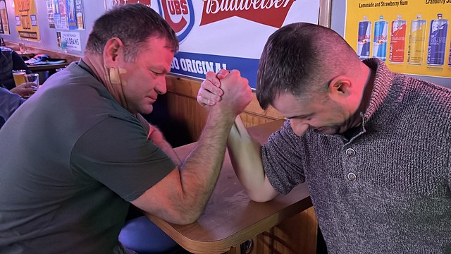 Arm wrestling the toughest looking dude in the place