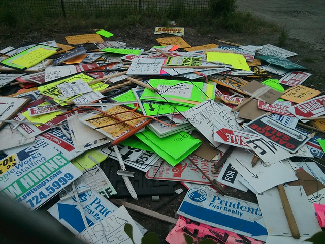 This is apparently where signs go that get stuck on city prooerty.