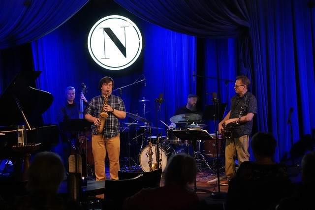 Wayne performing with one of his former students