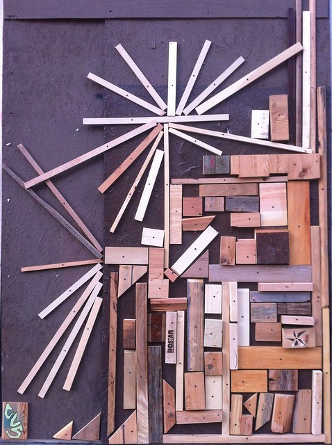 Randomly saw a dude powerdrilling all these wooden blocks onto a wall on milwaukee ave