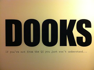 Signs - At Roots, the QC style pizza joint in Chicago, the bathroom doors are labeled DAISY and DOOKS, ha.