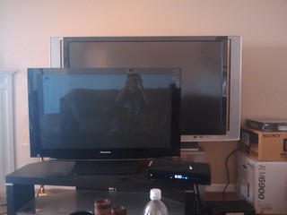 Tech - A big TV in front of a bigger TV