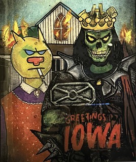 Art - Greetings Iowa. The monsters and American gothic house being on fire feels pretty appropriate.