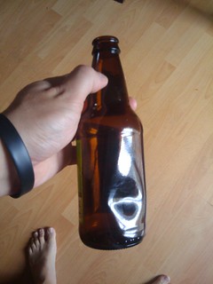 Dented Beer Bottle
