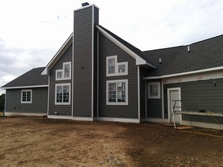 Siding going up at mom n Rod's