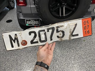 Broken - Second favorite souvenir from Germany. This was my front license plate.