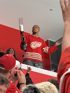 Hockey - Amon-Ra St Brown chillin in the suite behind me.