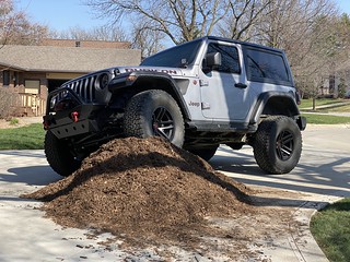 Covid-19 - Neighbor is daring me to scoop the mulch til it falls