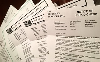 New hobby: chatting with collections agencies about how I didn't write personal checks at big box stores in Nebraska