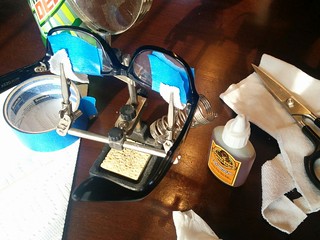 ok, I need an old sock, scissors, masking tape, gorilla glue, a toothpick , a damp paper towel, h...