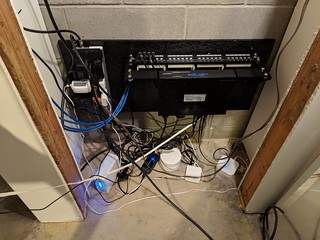 Tech - Mini network closet phase 1: mounted patches panel, switch, and surge protector