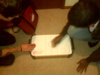 Cedric has mini air hockey