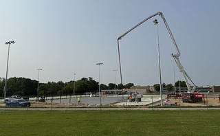 They're puttin down a shitload of concrete at the park and it has my neighbors' panties all up in...