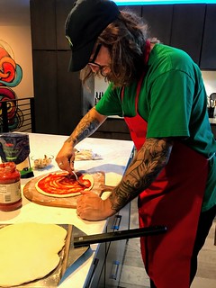 pizza - Saucing some pizzas for the grill