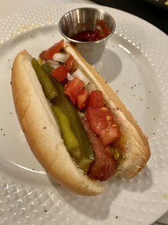Washing down the mobiyashi dog with a Chicago dog
