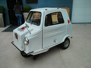 A tiny three wheeled car